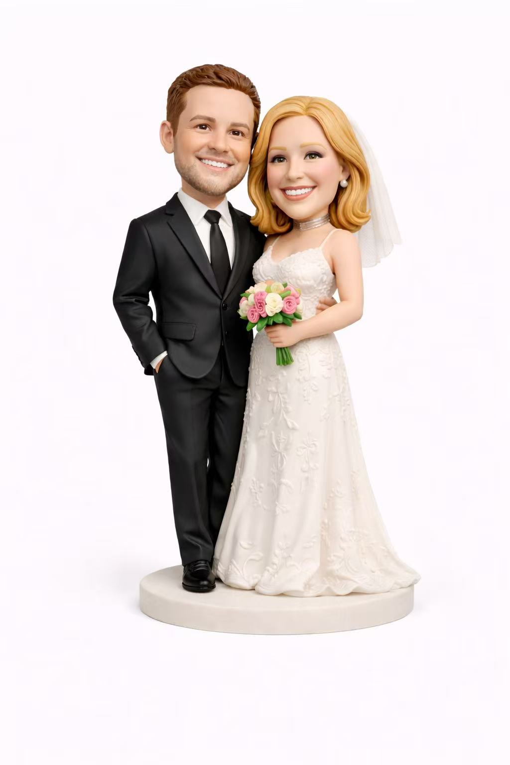 The bride's wedding dress, the groom's suit, and custom-engraved Valentine's Day bobblehead dolls.