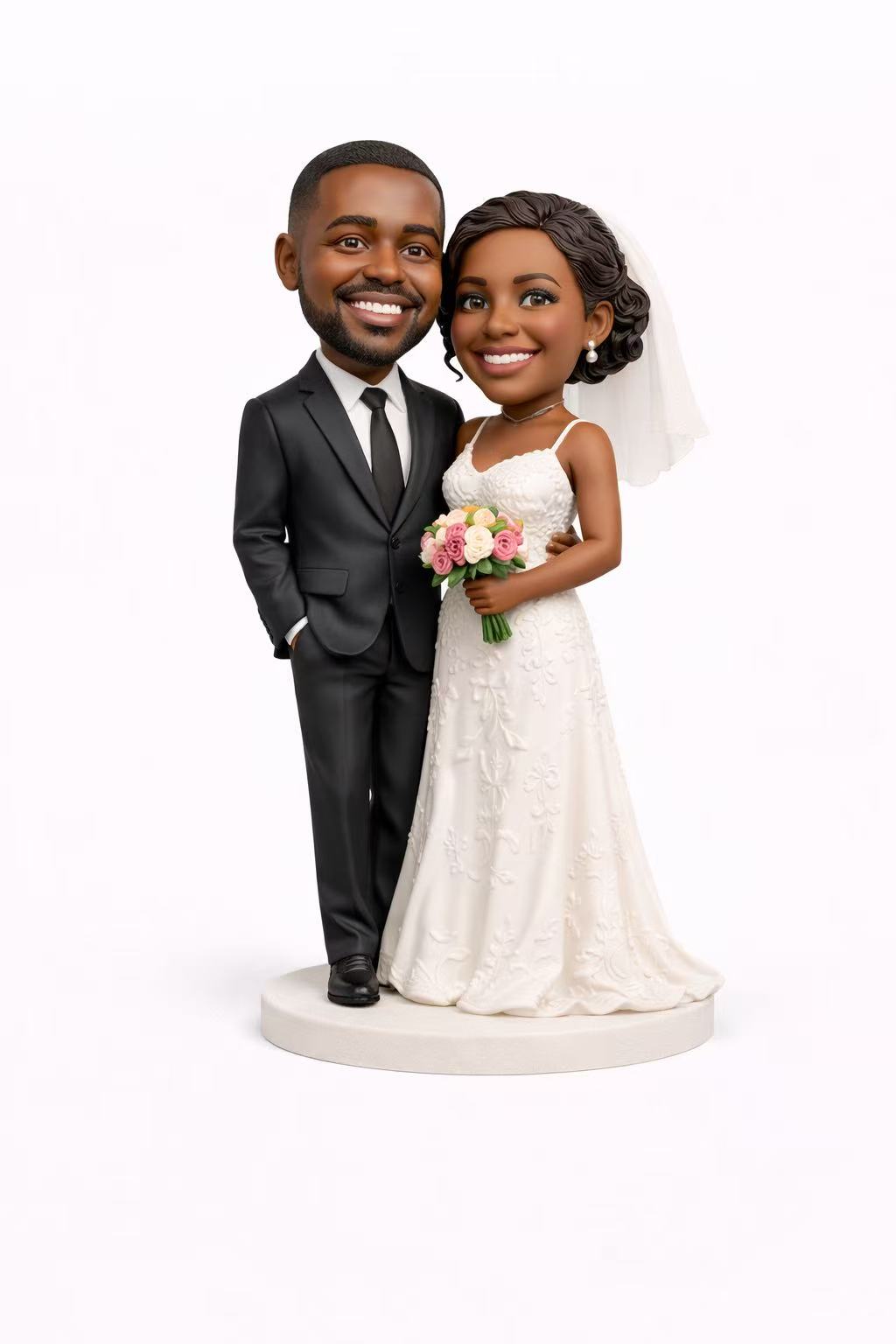 The bride's wedding dress, the groom's suit, and custom-engraved Valentine's Day bobblehead dolls.